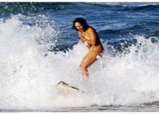 derrick felix add women naked surfing photo